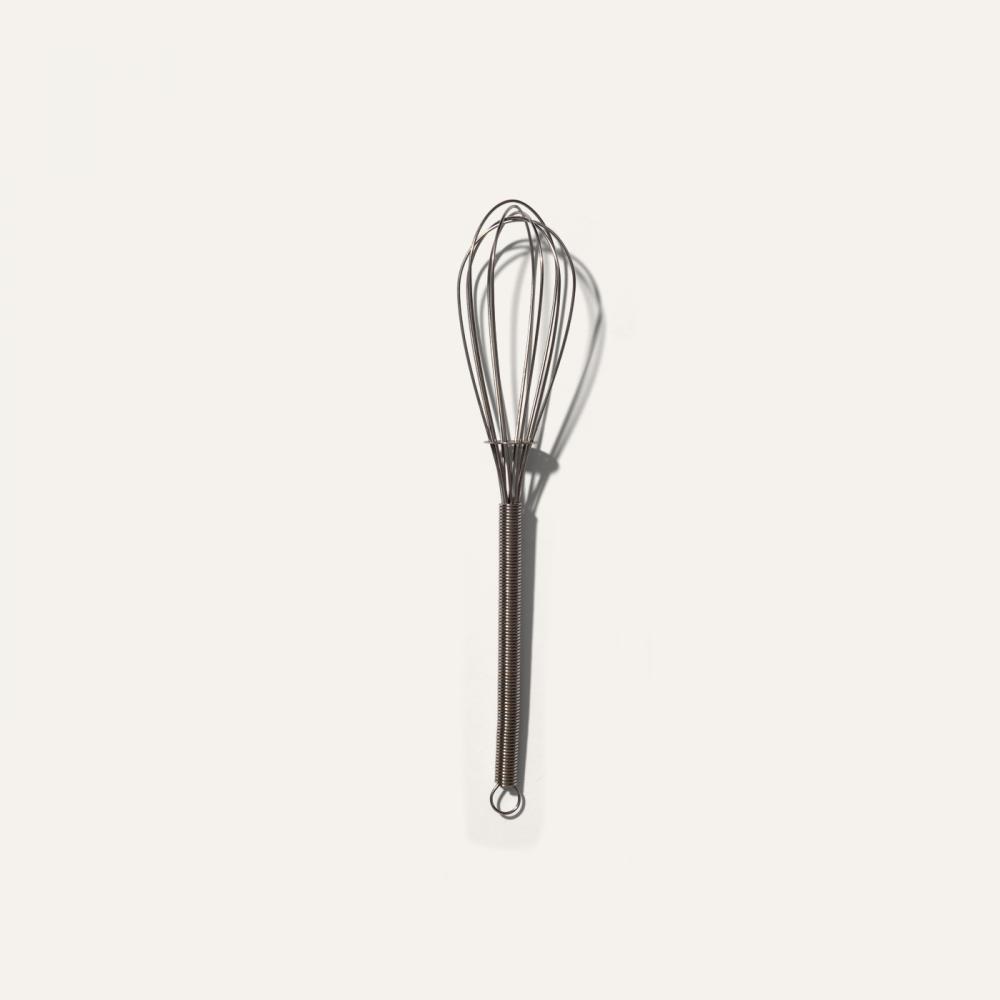 silver whisk