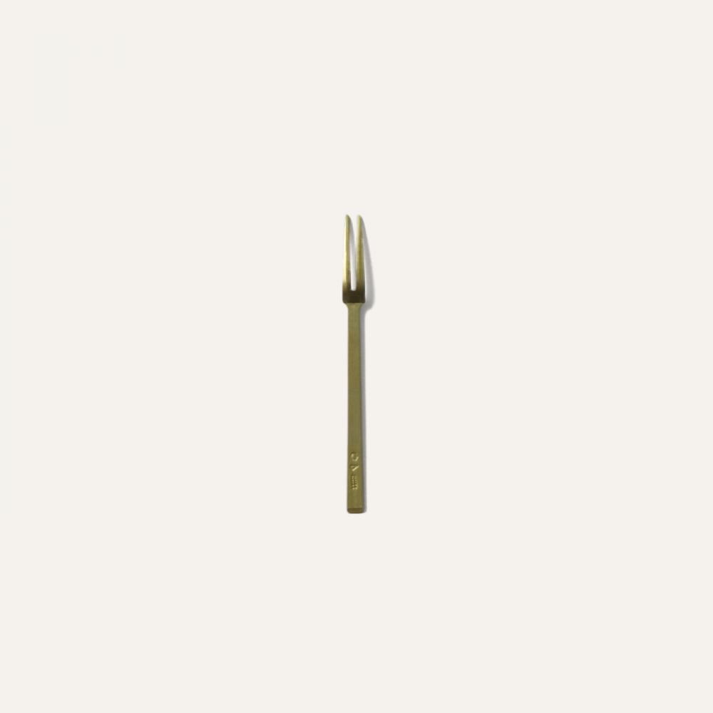 small brass fork