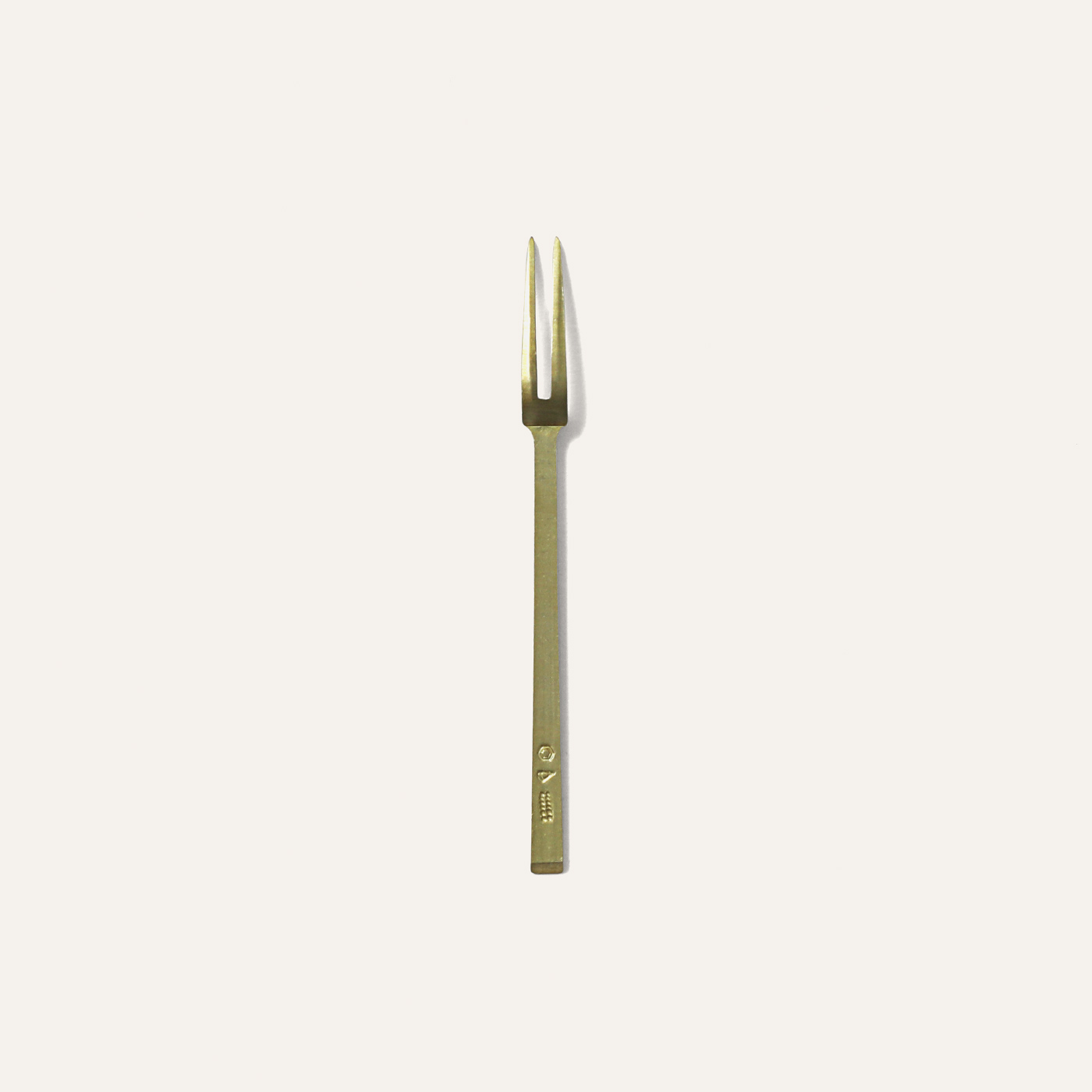 small brass fork